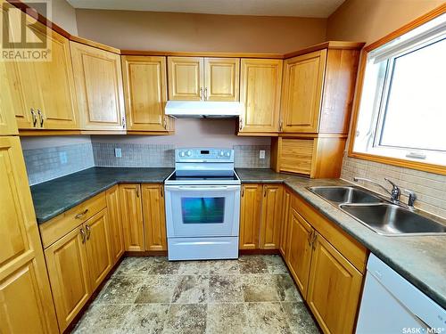 113 Lonsdale Street, Maple Creek, SK - Indoor Photo Showing Kitchen With Double Sink