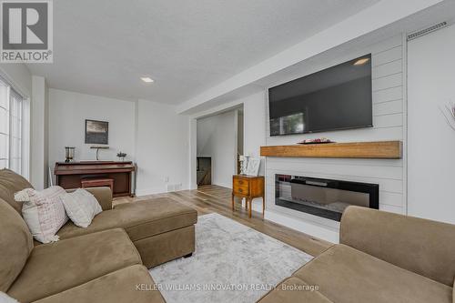 9 Highview Place, Kitchener, ON - Indoor Photo Showing Living Room With Fireplace