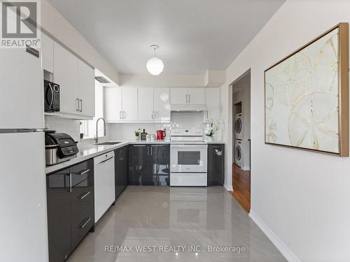 806 - 2470 Eglinton Avenue W, Toronto, ON - Indoor Photo Showing Kitchen