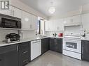 806 - 2470 Eglinton Avenue W, Toronto, ON  - Indoor Photo Showing Kitchen With Double Sink 