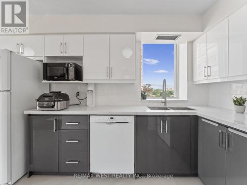 806 - 2470 Eglinton Avenue W, Toronto, ON - Indoor Photo Showing Kitchen With Double Sink