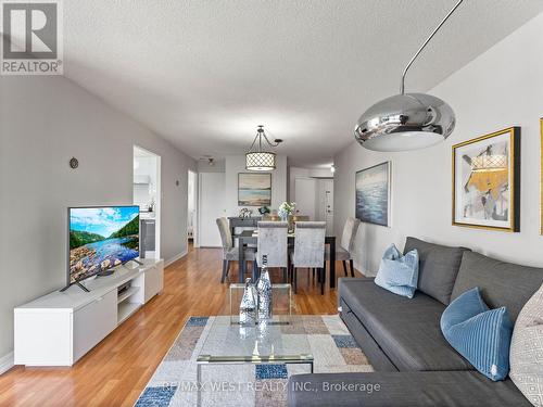 806 - 2470 Eglinton Avenue W, Toronto, ON - Indoor Photo Showing Living Room