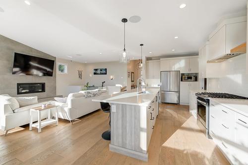 10335 Long Road, Lake Country, BC - Indoor Photo Showing Kitchen With Fireplace With Upgraded Kitchen