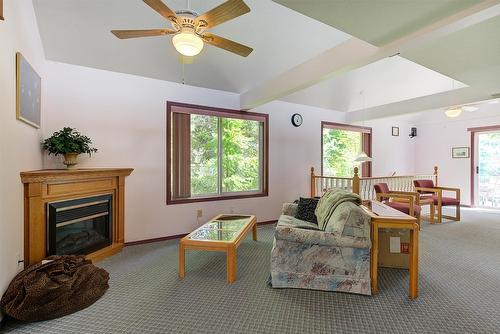 1306 Huckleberry Road, Kelowna, BC - Indoor Photo Showing Other Room With Fireplace