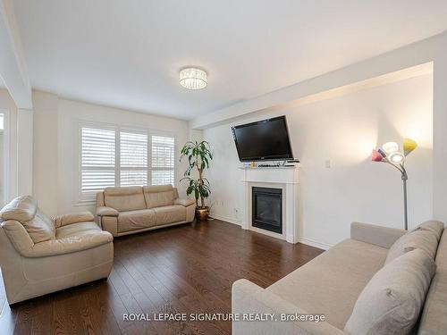 197 Thornbush Blvd, Brampton, ON - Indoor Photo Showing Living Room With Fireplace