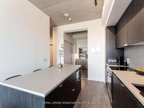 704-7 Smith Cres, Toronto, ON - Indoor Photo Showing Kitchen With Double Sink