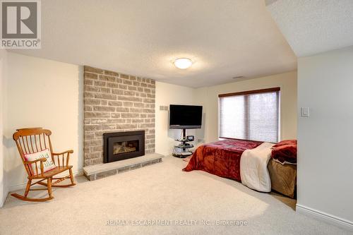 1394 Hazelton Boulevard, Burlington, ON - Indoor Photo Showing Bedroom With Fireplace