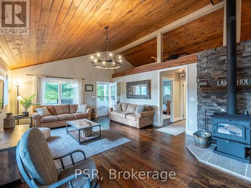 6180 Kahshe Lake, Gravenhurst, ON - Indoor Photo Showing Living Room With Fireplace