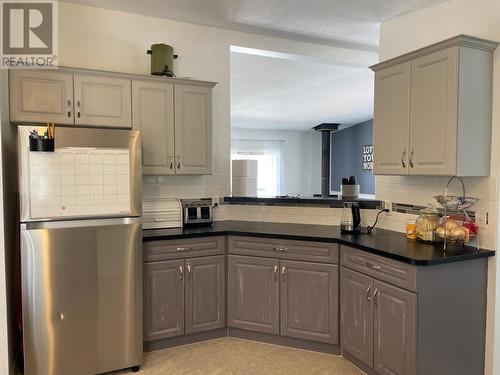 166 Mcconachie Creek Road, Fort Nelson, BC - Indoor Photo Showing Kitchen