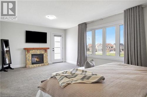 19 Netherwood Road, Kitchener, ON - Indoor Photo Showing Bedroom With Fireplace