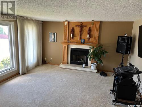 111 Smoothstone Crescent, Saskatoon, SK - Indoor Photo Showing Other Room With Fireplace