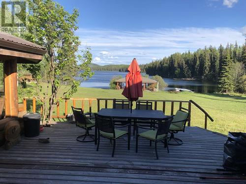 7806 N Bonaparte Road, 100 Mile House, BC - Outdoor With Body Of Water With Deck Patio Veranda With View