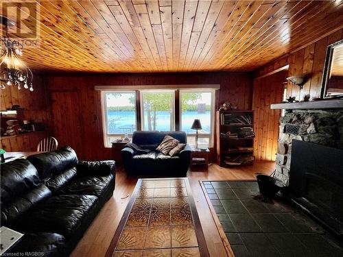 57 Hope Drive, Northern Bruce Peninsula, ON - Indoor Photo Showing Living Room With Fireplace