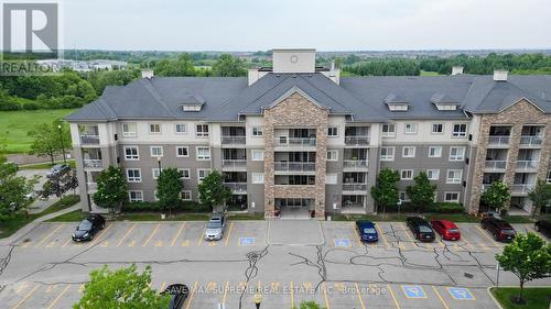 2212 - 6 Dayspring Circle, Brampton, ON - Outdoor With Balcony With Facade