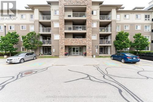 2212 - 6 Dayspring Circle, Brampton, ON - Outdoor With Balcony With Facade