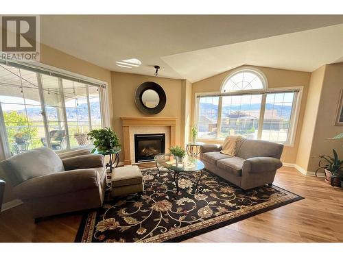 3808 Sawgrass Drive, Osoyoos, BC - Indoor Photo Showing Living Room With Fireplace