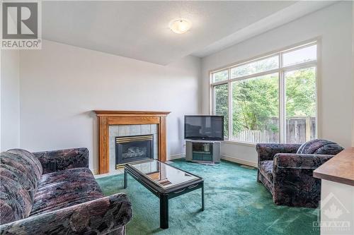 33 Halkirk Avenue, Kanata, ON - Indoor Photo Showing Living Room With Fireplace