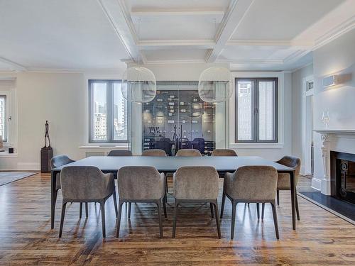 Vue d'ensemble - 59-1509 Rue Sherbrooke O., Montréal (Ville-Marie), QC - Indoor Photo Showing Dining Room With Fireplace