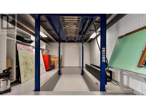 Car Elevator - 764 Rockcliffe Place, Kelowna, BC - Indoor Photo Showing Basement