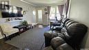 460 4Th Avenue Nw, Swift Current, SK  - Indoor Photo Showing Living Room 