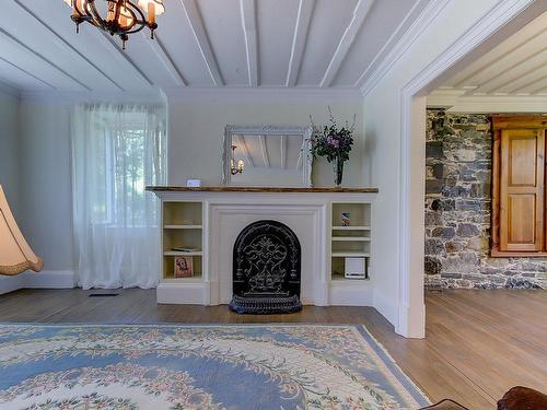 Salon - 411 Ch. Des Moulins, Mont-Saint-Hilaire, QC - Indoor With Fireplace