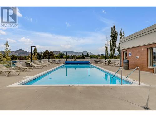 1160 Bernard Avenue Unit# 305, Kelowna, BC - Outdoor With In Ground Pool