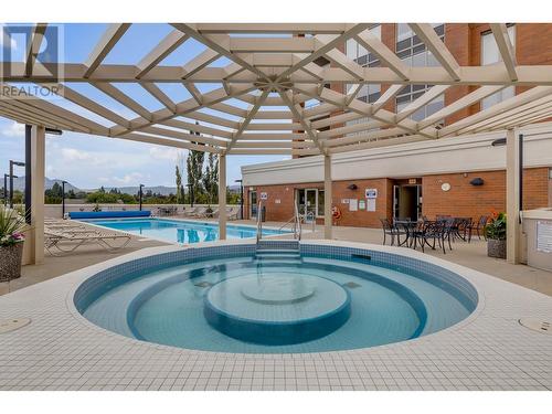 1160 Bernard Avenue Unit# 305, Kelowna, BC - Indoor Photo Showing Other Room With In Ground Pool