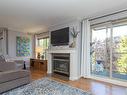 302-1217 Pandora Ave, Victoria, BC  - Indoor Photo Showing Living Room With Fireplace 