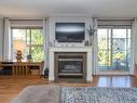 302-1217 Pandora Ave, Victoria, BC  - Indoor Photo Showing Living Room With Fireplace 