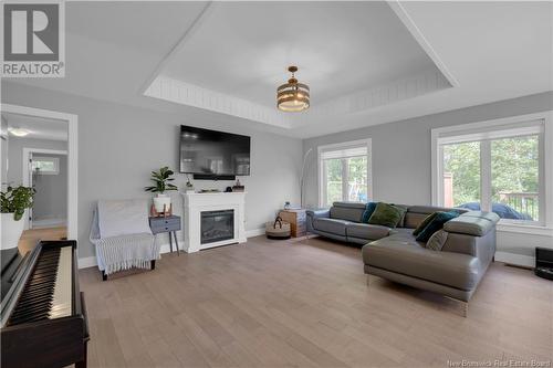 168 Vincent Road, Quispamsis, NB - Indoor Photo Showing Living Room With Fireplace