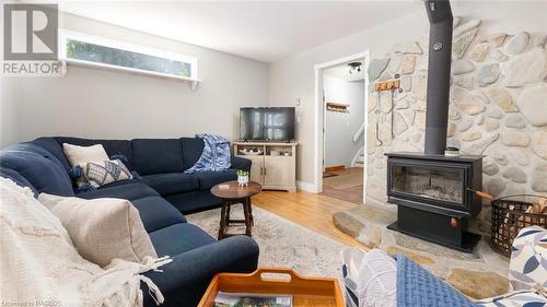 11 Shoreline Drive, Northern Bruce Peninsula, ON - Indoor Photo Showing Living Room With Fireplace