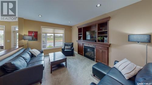 8247 Fairways West Drive, Regina, SK - Indoor Photo Showing Living Room With Fireplace