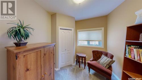 8247 Fairways West Drive, Regina, SK - Indoor Photo Showing Living Room With Fireplace