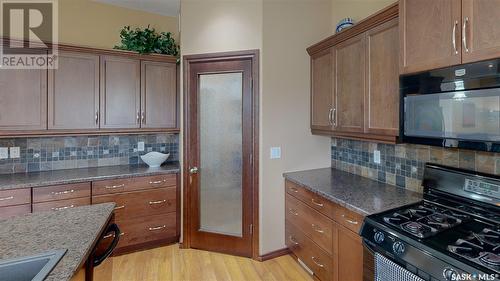 8247 Fairways West Drive, Regina, SK - Indoor Photo Showing Kitchen With Double Sink