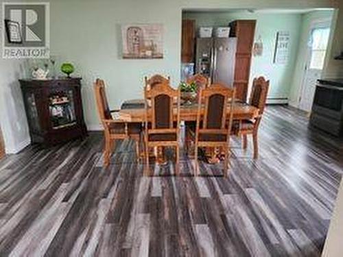 3 Sunset Drive, Badger, NL - Indoor Photo Showing Dining Room With Fireplace