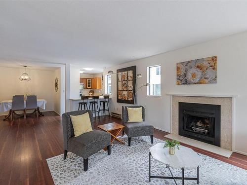 206-406 Simcoe St, Victoria, BC - Indoor Photo Showing Living Room With Fireplace