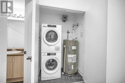 110 - 4 Spice Way, Barrie (Innis-Shore), ON - Indoor Photo Showing Laundry Room