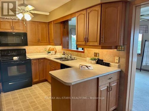 363 Country Club Circle, Kawartha Lakes, ON - Indoor Photo Showing Kitchen With Double Sink