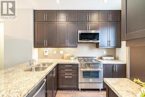 1402A Eglinton Avenue W, Toronto, ON - Indoor Photo Showing Kitchen With Double Sink With Upgraded Kitchen