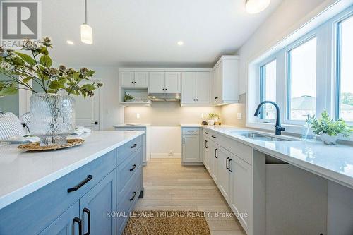 49 White Tail Path, Central Elgin, ON - Indoor Photo Showing Kitchen With Double Sink With Upgraded Kitchen