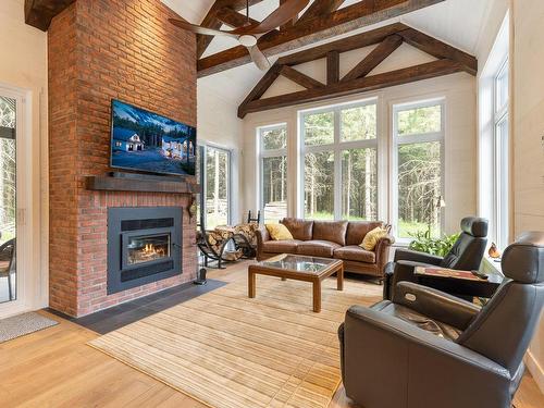 Living room - 451 Ch. Simoneau, Orford, QC - Indoor Photo Showing Living Room With Fireplace