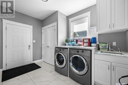 4220 Sage Place, Regina, SK - Indoor Photo Showing Laundry Room
