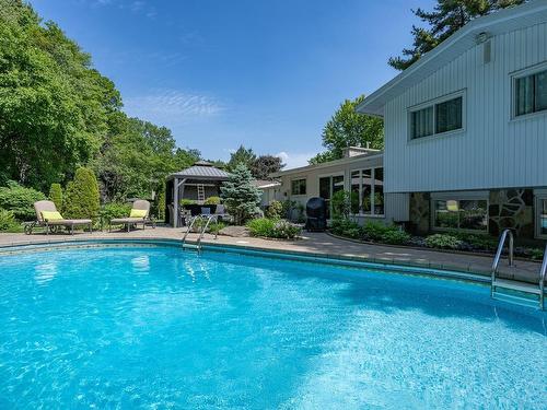 Pool - 25 Av. De Montsec, Lorraine, QC - Outdoor With In Ground Pool With Backyard