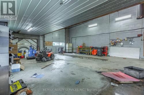 686026 Highway 2, Woodstock, ON - Indoor Photo Showing Garage