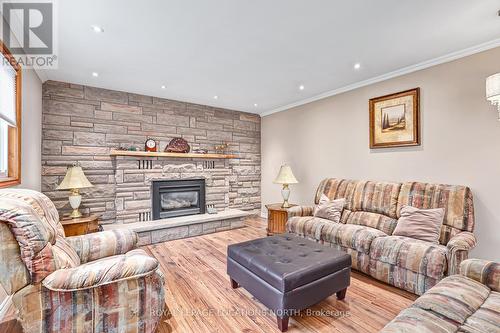239 Oxbow Park Road, Wasaga Beach, ON - Indoor Photo Showing Living Room With Fireplace