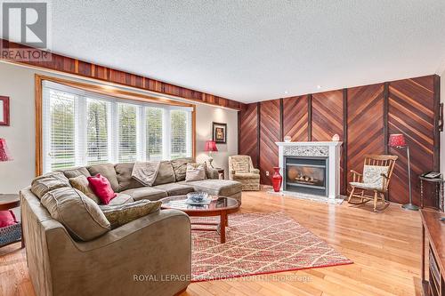 239 Oxbow Park Road, Wasaga Beach, ON - Indoor Photo Showing Living Room With Fireplace