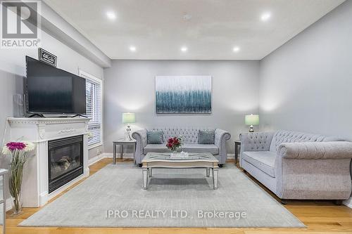 307 Teetzel Drive, Milton, ON - Indoor Photo Showing Living Room With Fireplace