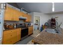 4826 Lazelle Avenue, Terrace, BC  - Indoor Photo Showing Kitchen With Double Sink 