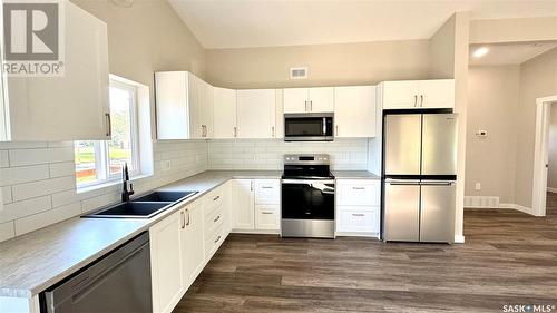 210 Coulthard Street, Conquest, SK - Indoor Photo Showing Kitchen With Double Sink