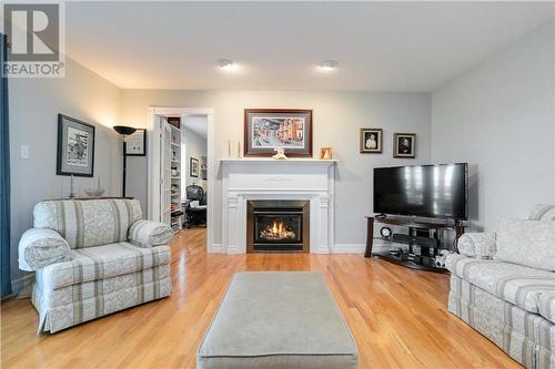 12 Oakcroft Crescent, Moncton, NB - Indoor Photo Showing Living Room With Fireplace